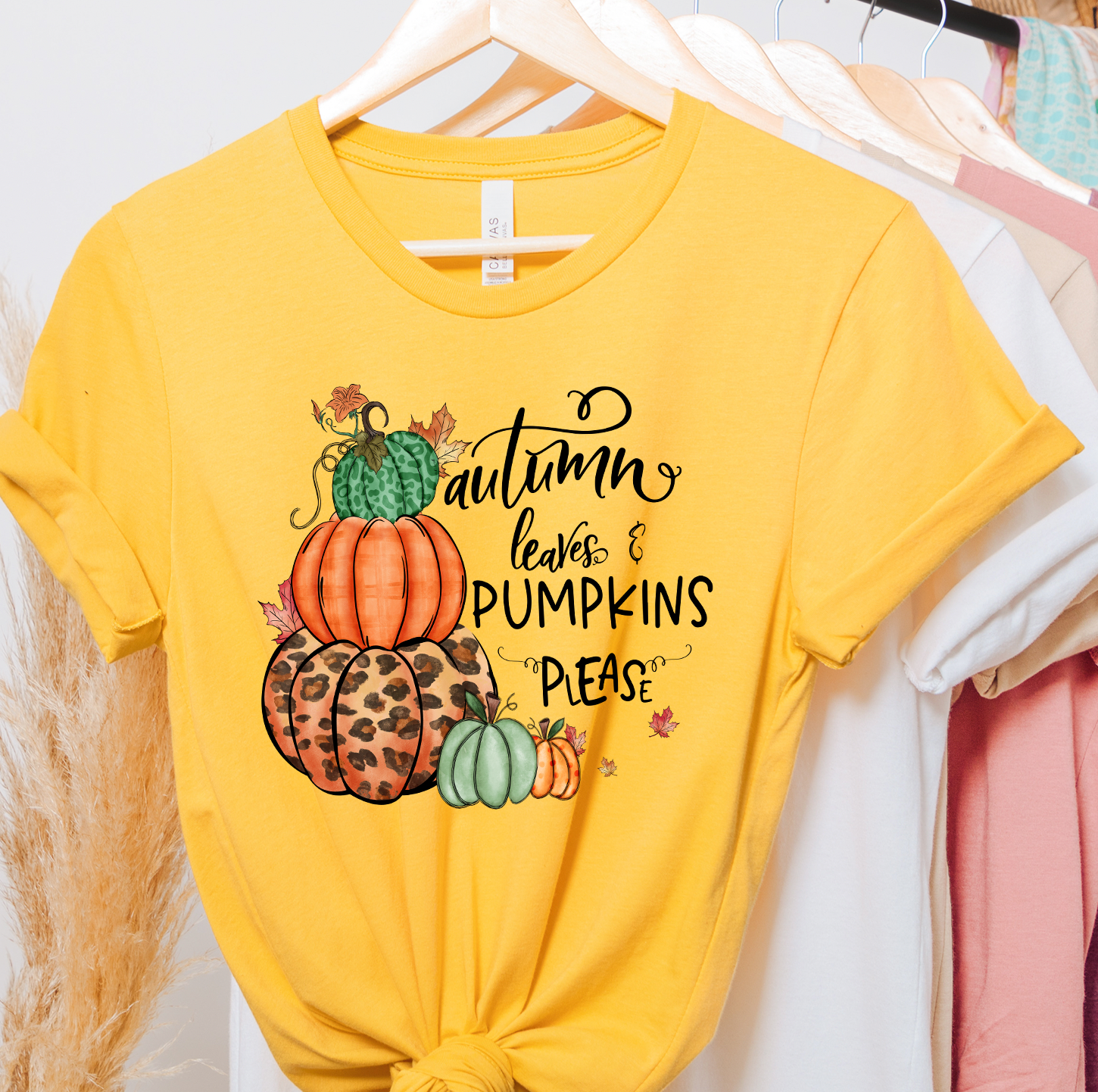 Autumn Leaves and Pumpkins Please Unisex T-shirt featuring vibrant autumn-themed design.