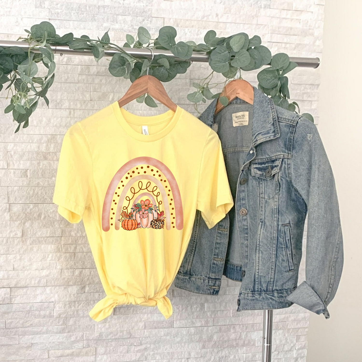 Autumn Rainbow Unisex T-shirt featuring vibrant colors and a stylish design, perfect for fall fashion.