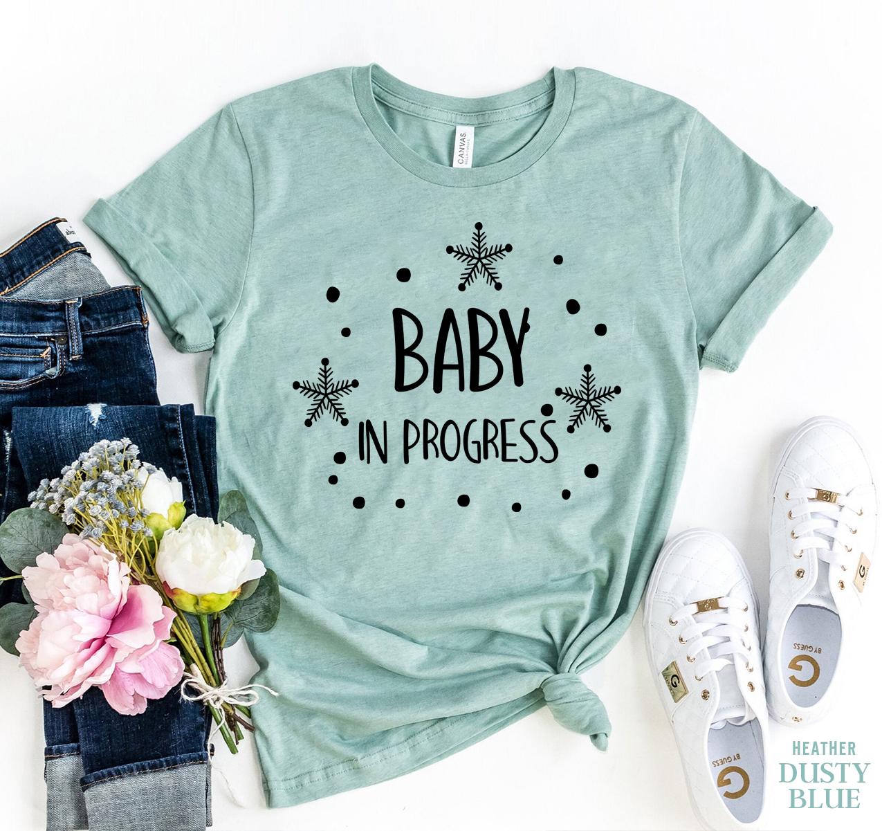 A stylish Baby In Progress T-shirt made from premium ring spun cotton, featuring a soft textile flex print design.