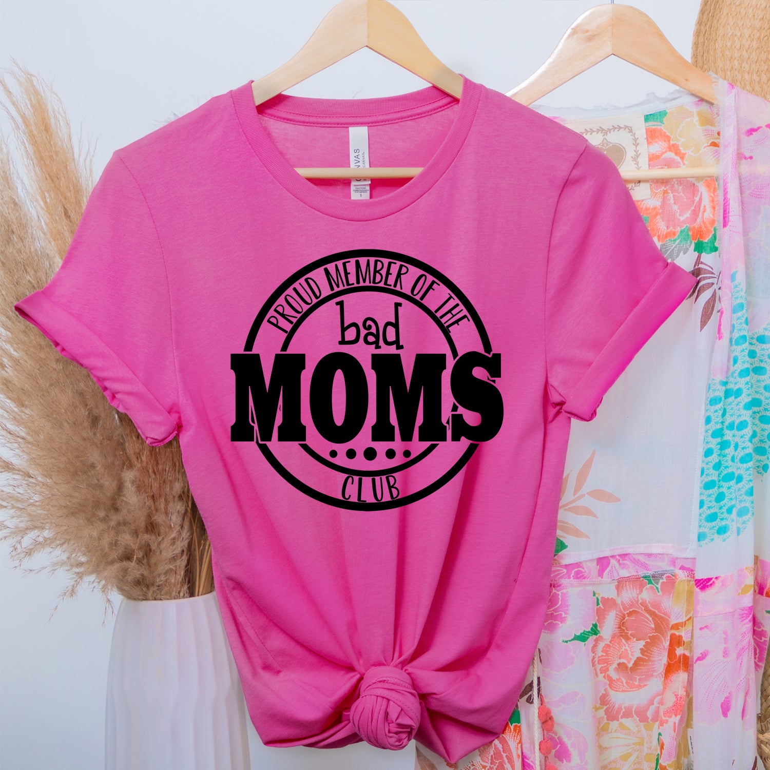 Bad Moms Club Unisex T-shirt featuring vibrant graphic design, perfect for stylish moms.