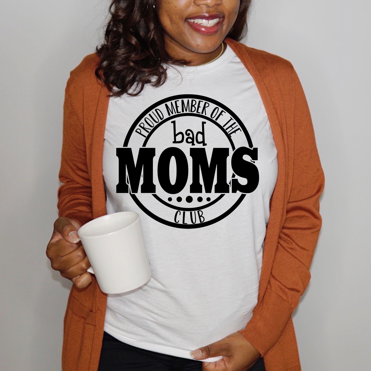 Bad Moms Club Unisex T-shirt featuring vibrant graphic design, perfect for stylish moms.