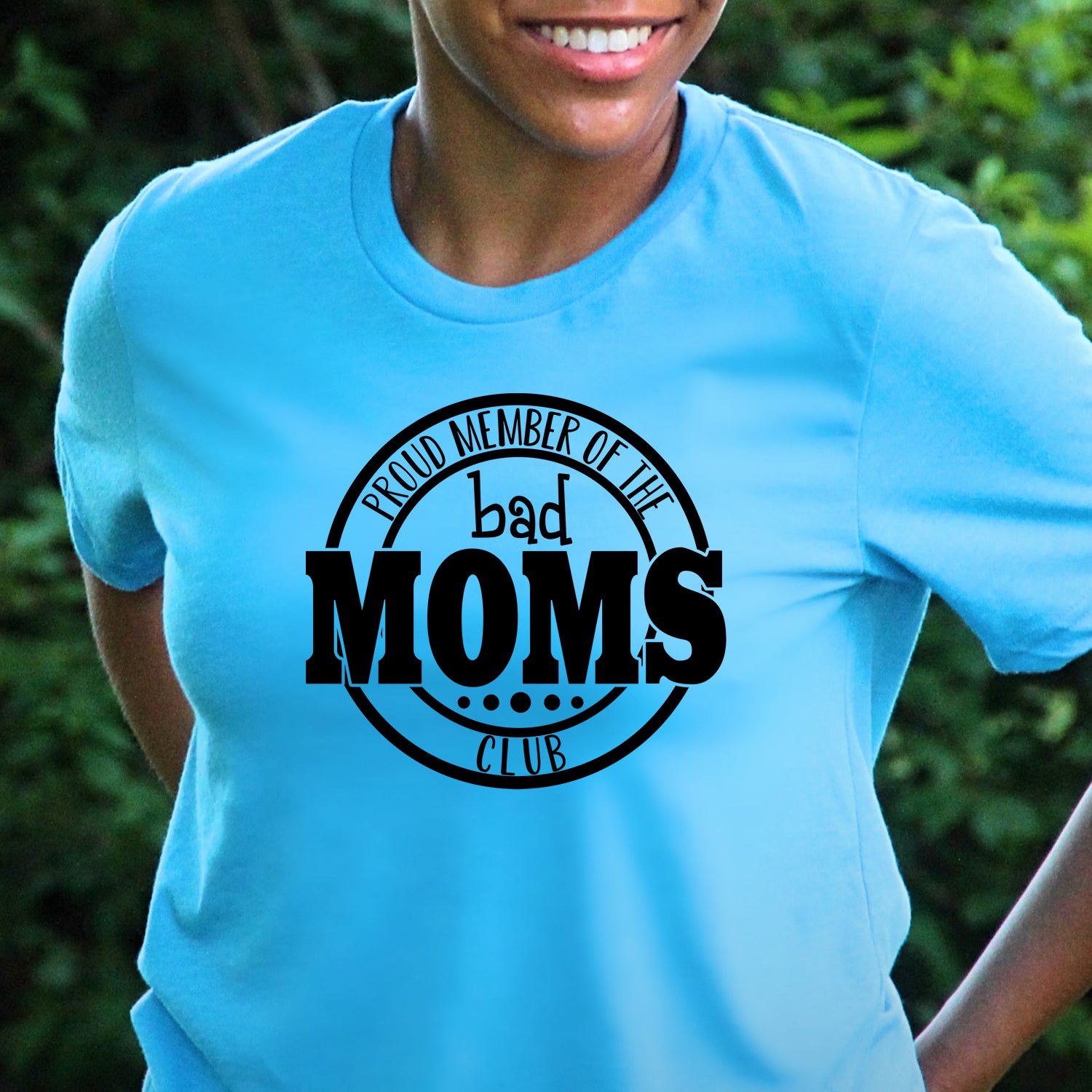 Bad Moms Club Unisex T-shirt featuring vibrant graphic design, perfect for stylish moms.