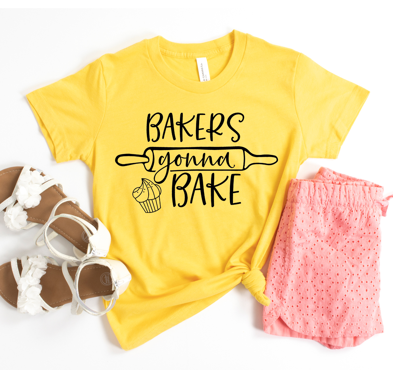 A stylish unisex T-shirt featuring the phrase 'Bakers Gonna Bake' in a comfortable fit, perfect for baking enthusiasts.