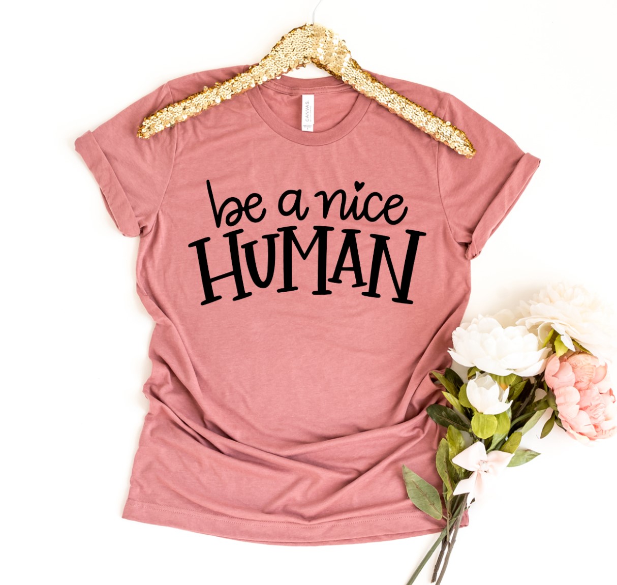 Be a Nice Human Shirt made of premium ring spun cotton with a soft flex print design, available in various sizes.