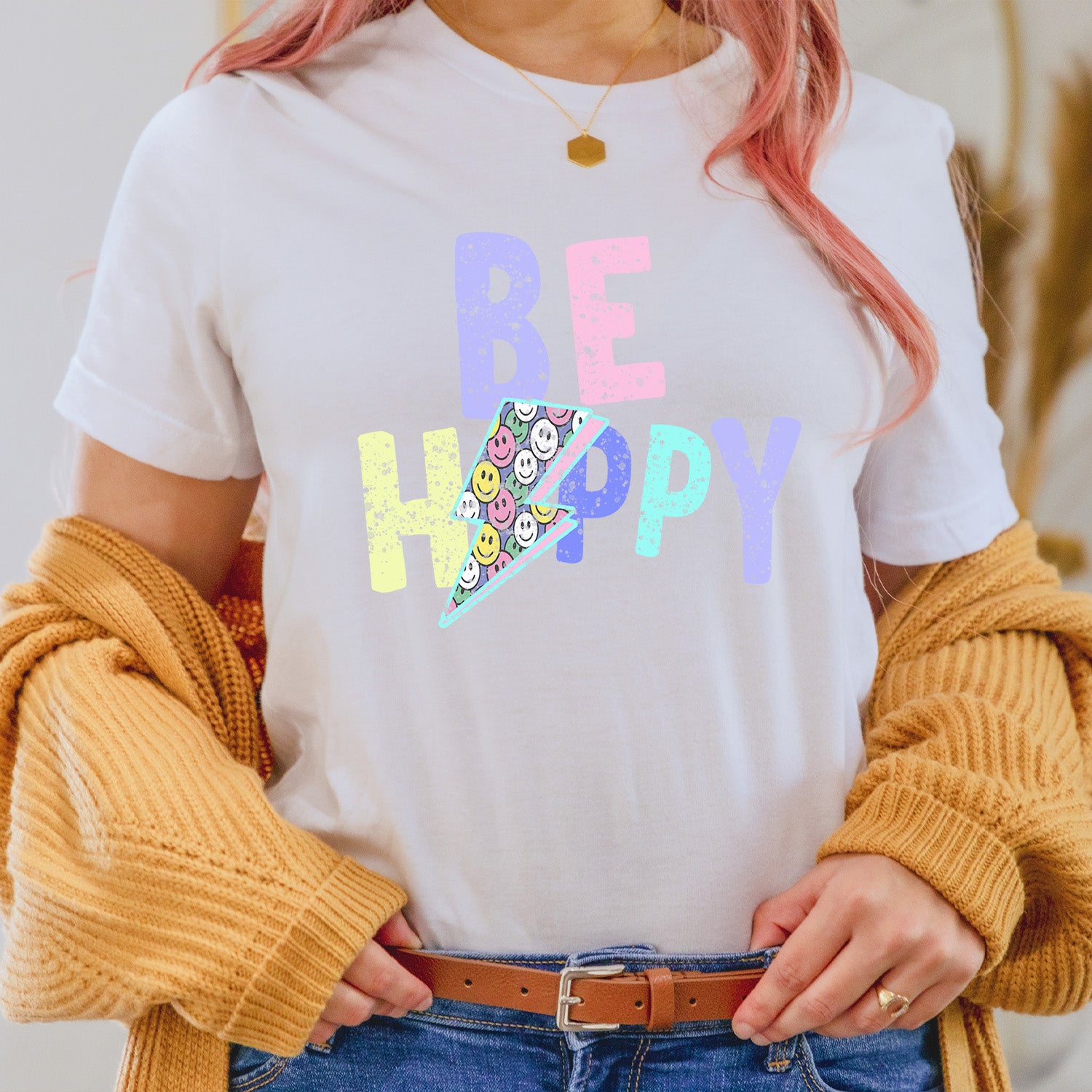 Be Happy Distressed Lightning Bolt Unisex T-shirt featuring a vibrant lightning bolt graphic on a soft fabric.