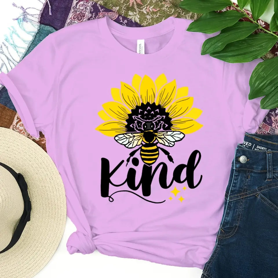 Bee Kind Sunflower Tee displayed on a mannequin, showcasing its soft fabric and vibrant sunflower design.