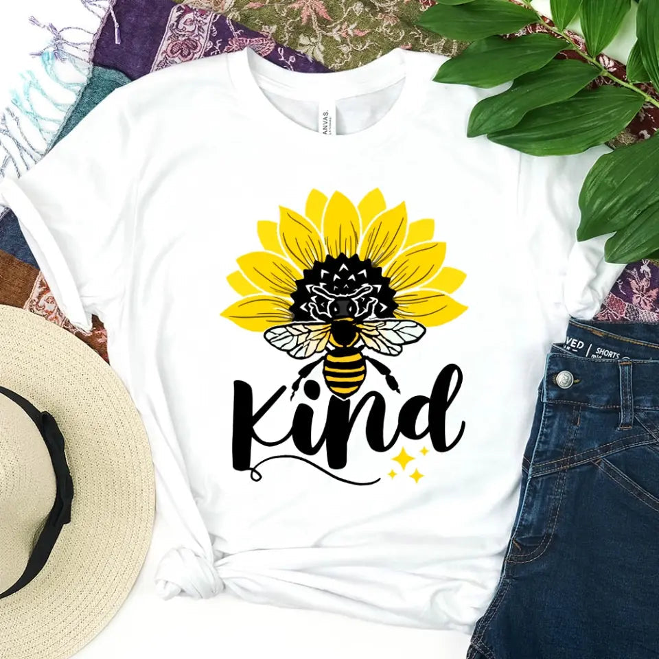 Bee Kind Sunflower Tee displayed on a mannequin, showcasing its soft fabric and vibrant sunflower design.