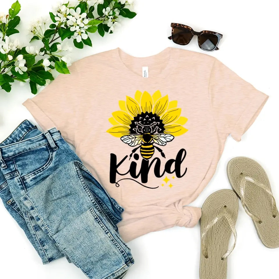 Bee Kind Sunflower Tee displayed on a mannequin, showcasing its soft fabric and vibrant sunflower design.