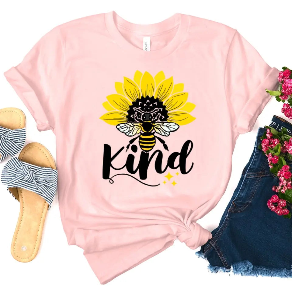 Bee Kind Sunflower Tee displayed on a mannequin, showcasing its soft fabric and vibrant sunflower design.
