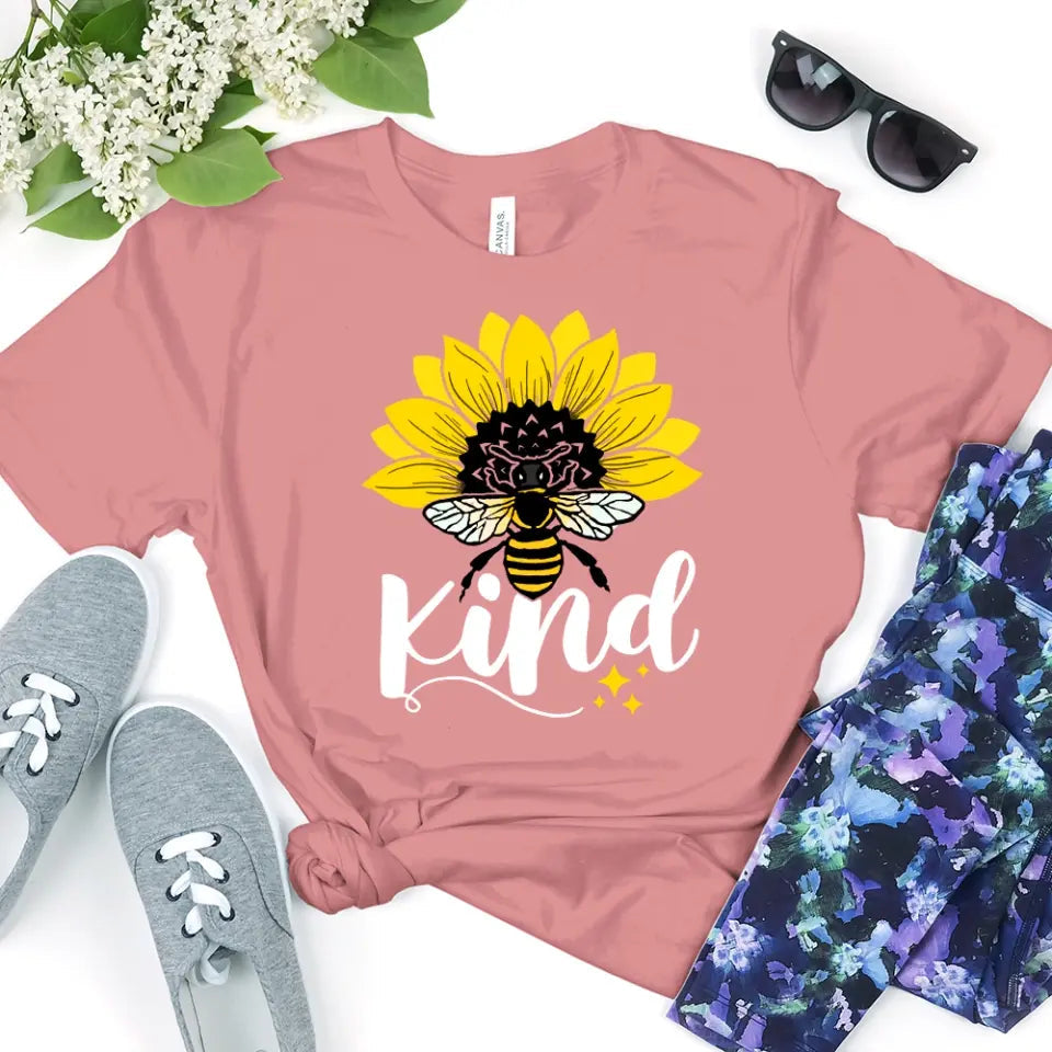 Bee Kind Sunflower Tee displayed on a mannequin, showcasing its soft fabric and vibrant sunflower design.