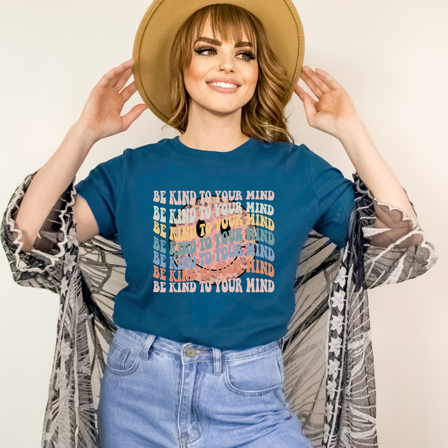 Be Kind To Your Mind Smiley Face Unisex T-shirt featuring a cheerful smiley face design on a soft fabric.