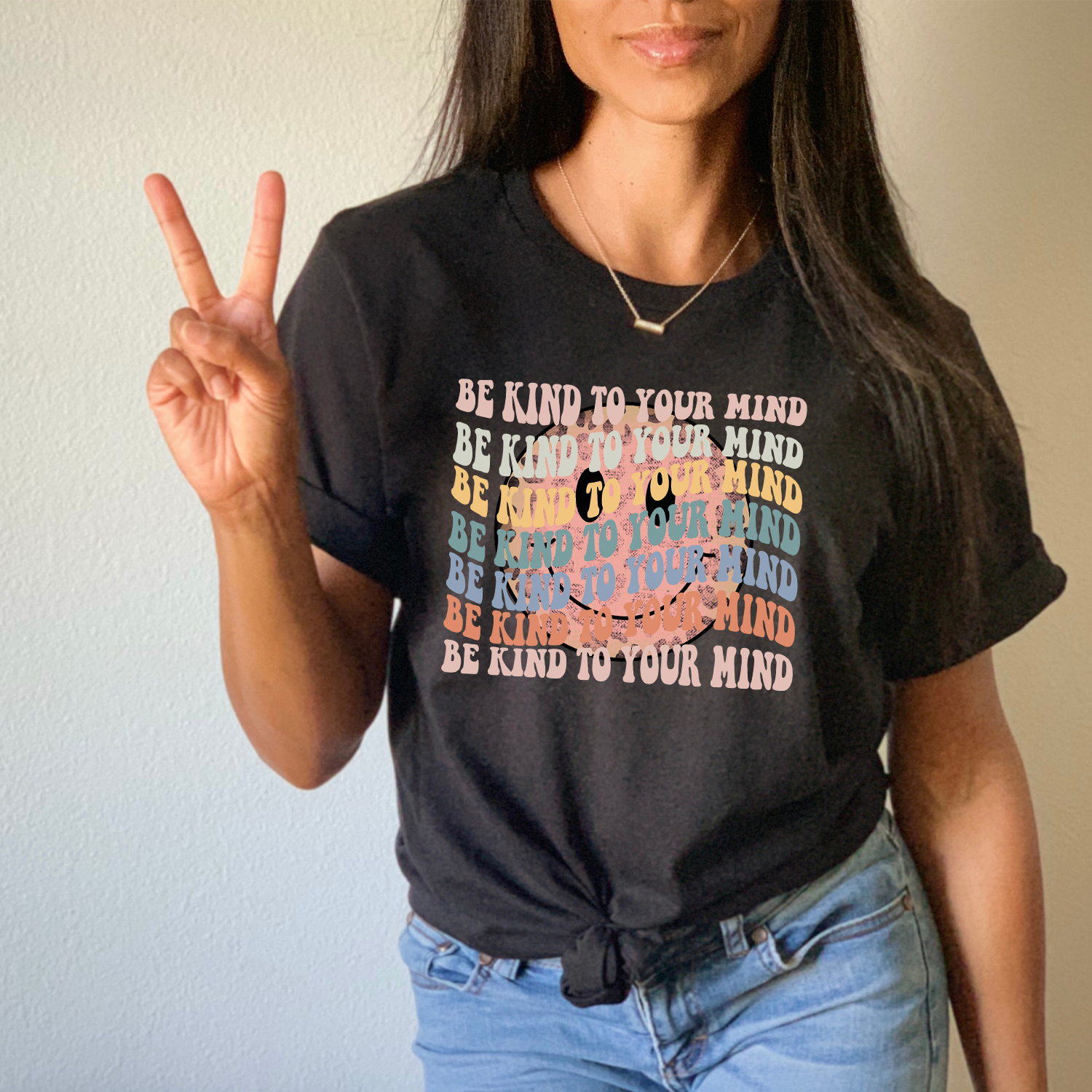 Be Kind To Your Mind Smiley Face Unisex T-shirt featuring a cheerful smiley face design on a soft fabric.