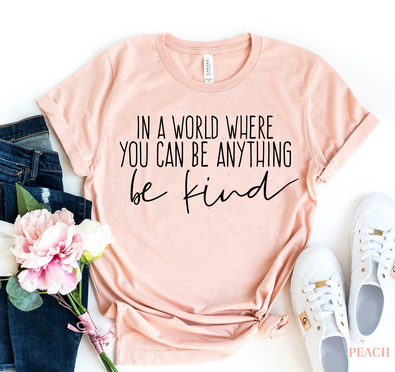 Be Kind T-shirt made from premium ring spun cotton, featuring a soft textile flex print design in various sizes.