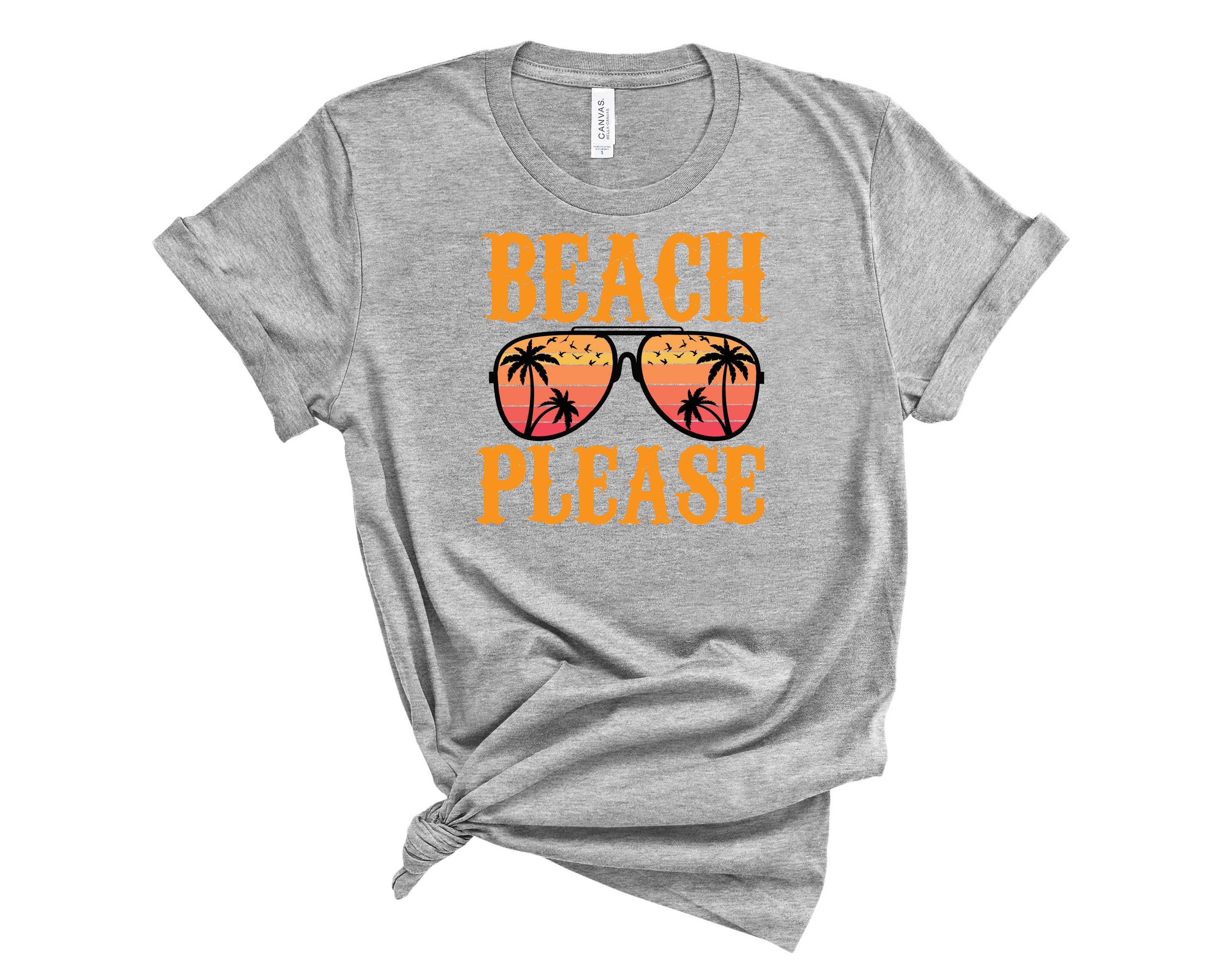 A stylish unisex graphic tee featuring the phrase 'Beach Please' with colorful glasses, perfect for summer wear.