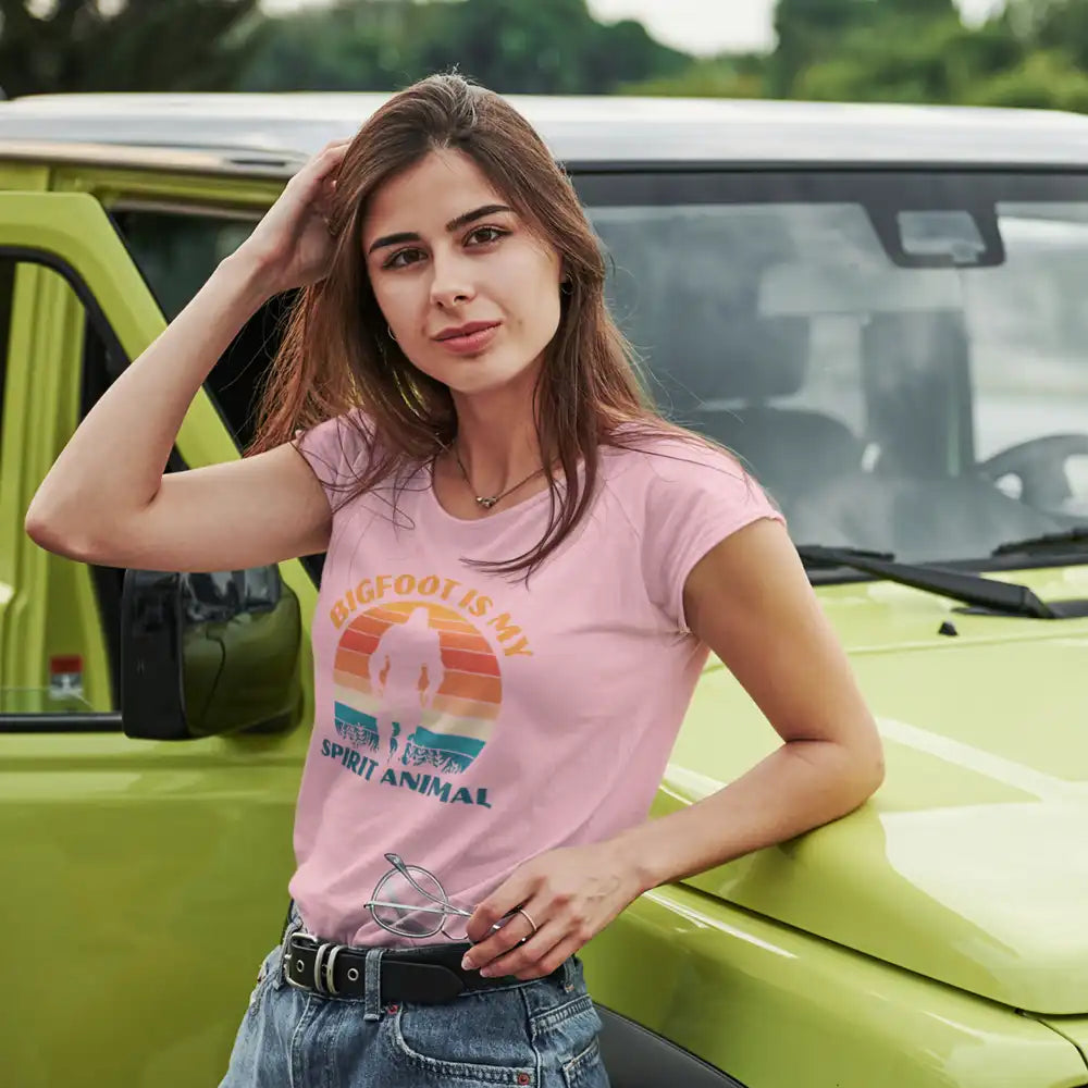 A stylish women's t-shirt featuring a unique Bigfoot design, perfect for casual wear and showcasing individuality.