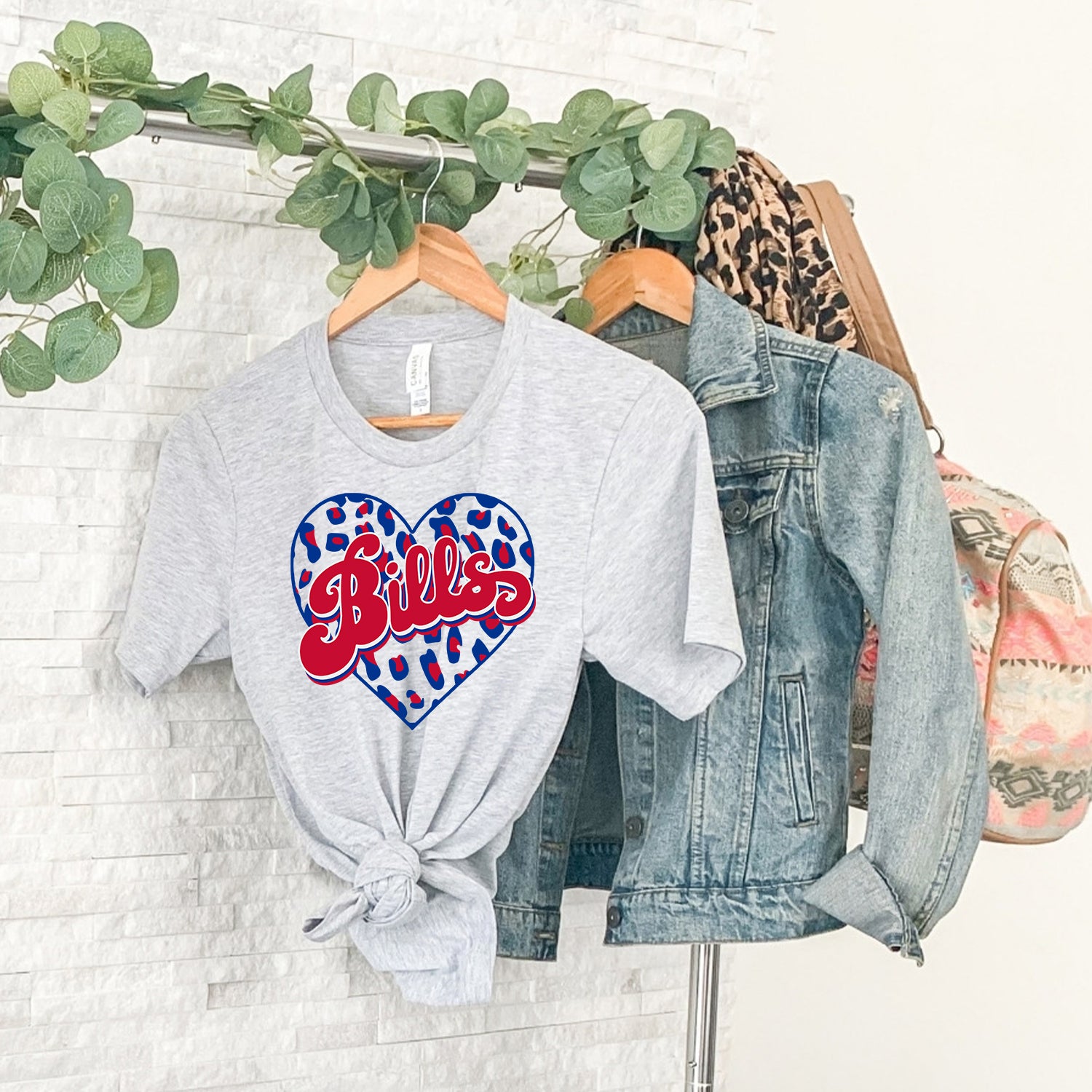 Bills Heart Leopard Unisex T-shirt featuring a vibrant leopard heart design on a soft fabric.