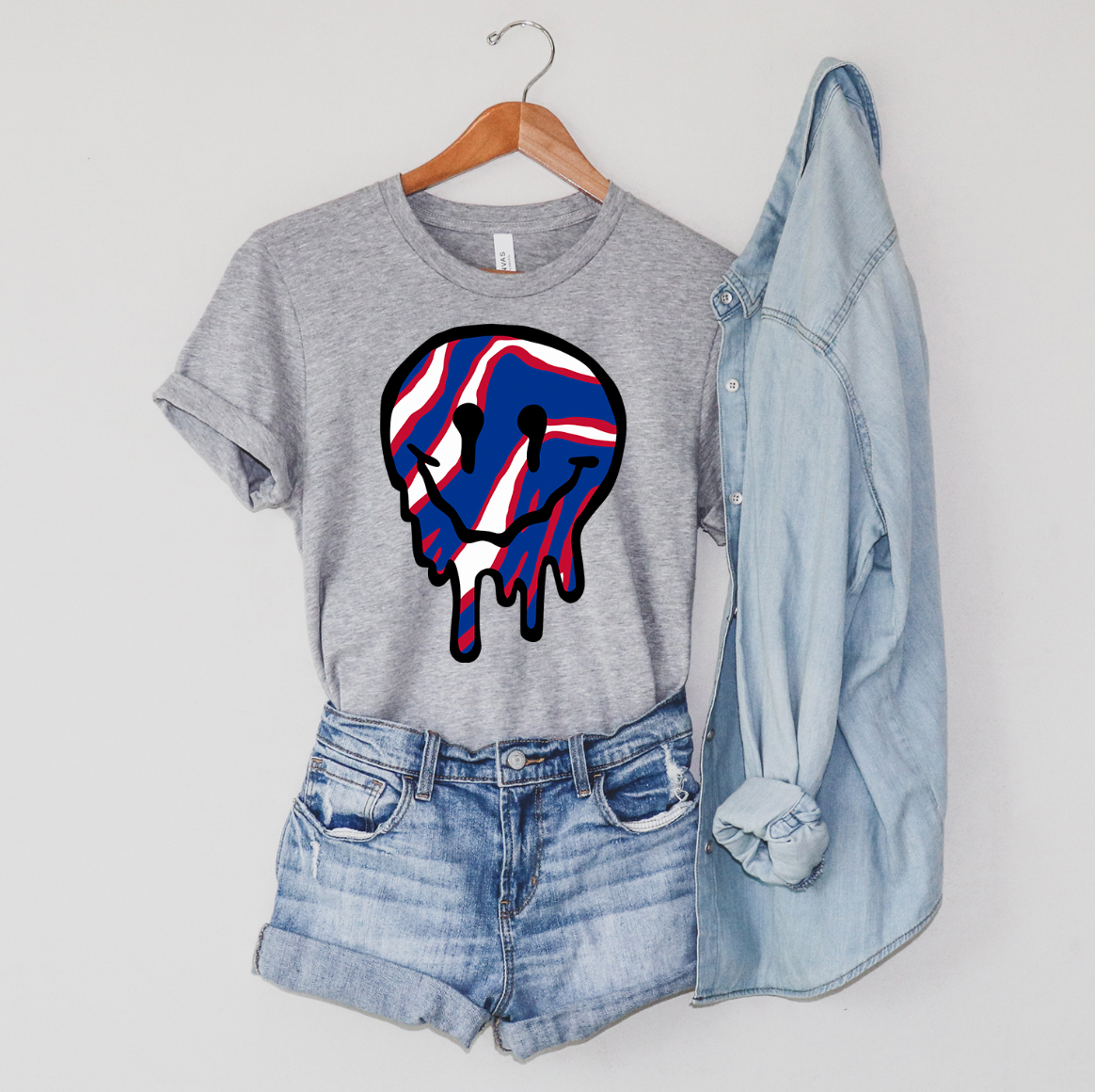 Bills Zubaz Drippy Face Unisex T-shirt featuring vibrant colors and unique design.