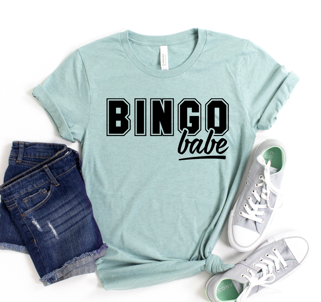 Bingo Babe T-shirt displayed on a hanger, showcasing its classic unisex design and soft fabric.