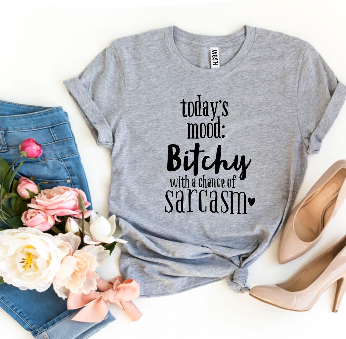 Bitchy With a Chance Of Sarcasm T-shirt displayed on a hanger, showcasing its soft cotton fabric and witty design.