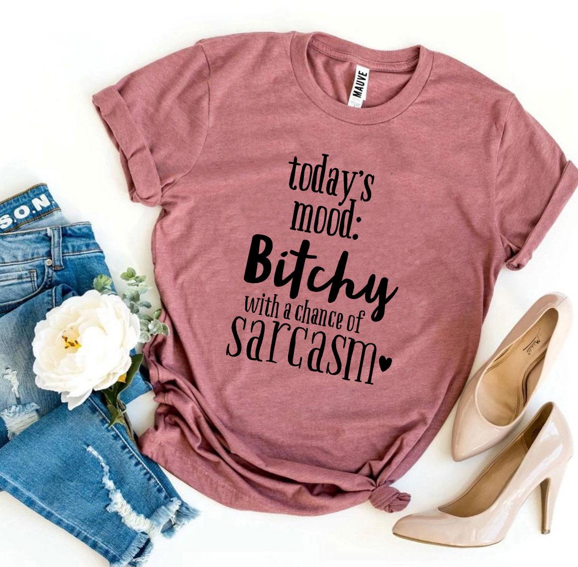 Bitchy With a Chance Of Sarcasm T-shirt displayed on a hanger, showcasing its soft cotton fabric and witty design.