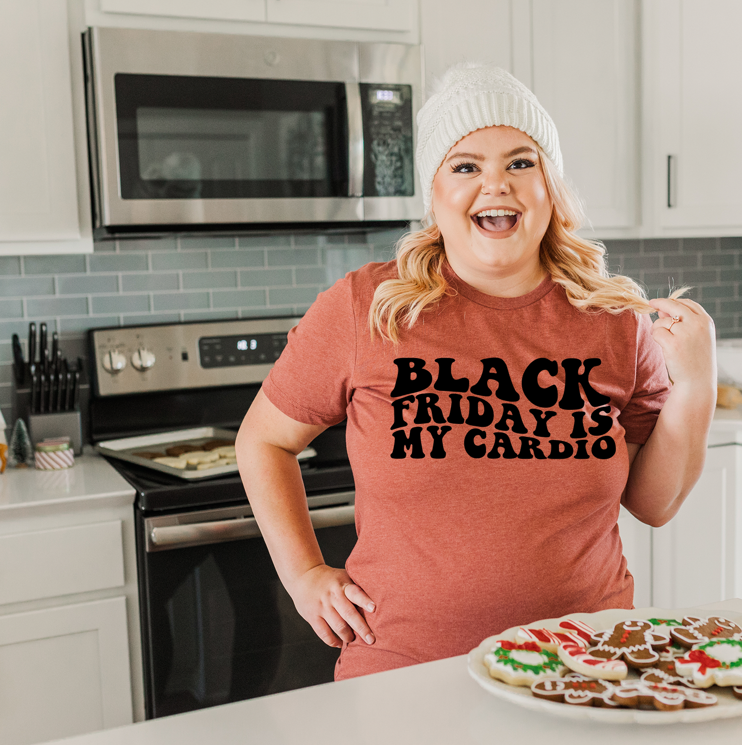 Black Friday Is My Cardio Unisex T-shirt displayed on a neutral background, showcasing its vibrant print and comfortable fit.