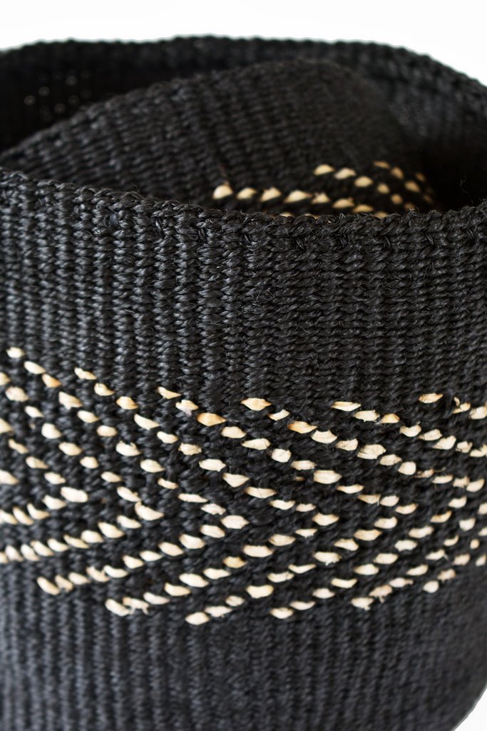 A set of two handwoven black sisal African planter and storage baskets, showcasing intricate patterns and natural fibers.