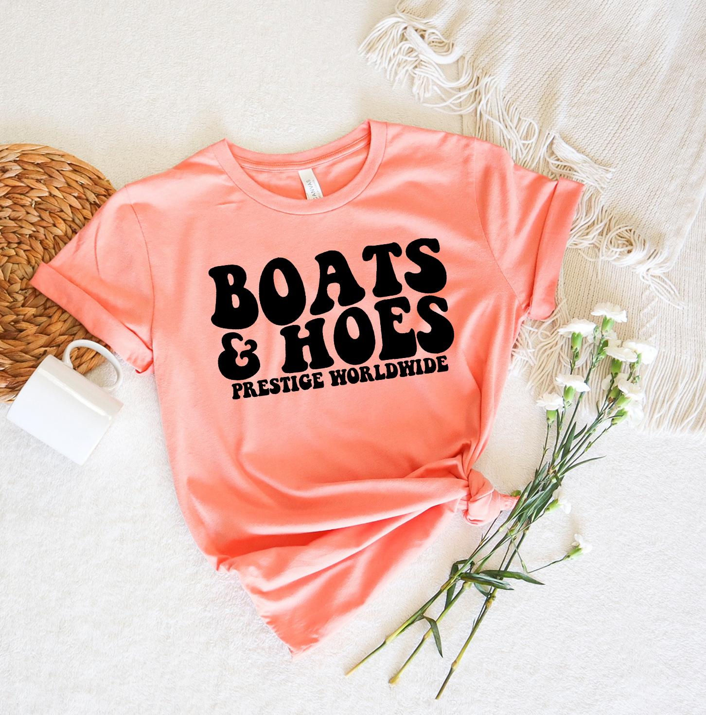 Boats and Hoes Unisex T-shirt featuring a vibrant graphic design, perfect for summer wear.
