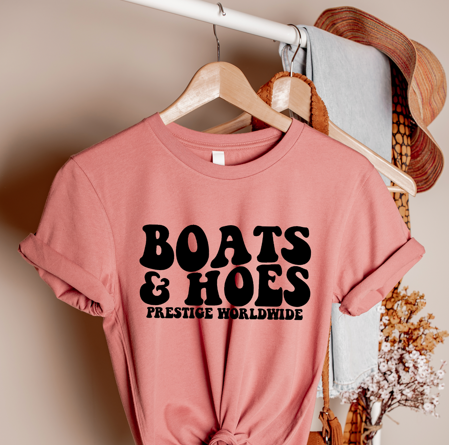 Boats and Hoes Unisex T-shirt featuring a vibrant graphic design, perfect for summer wear.