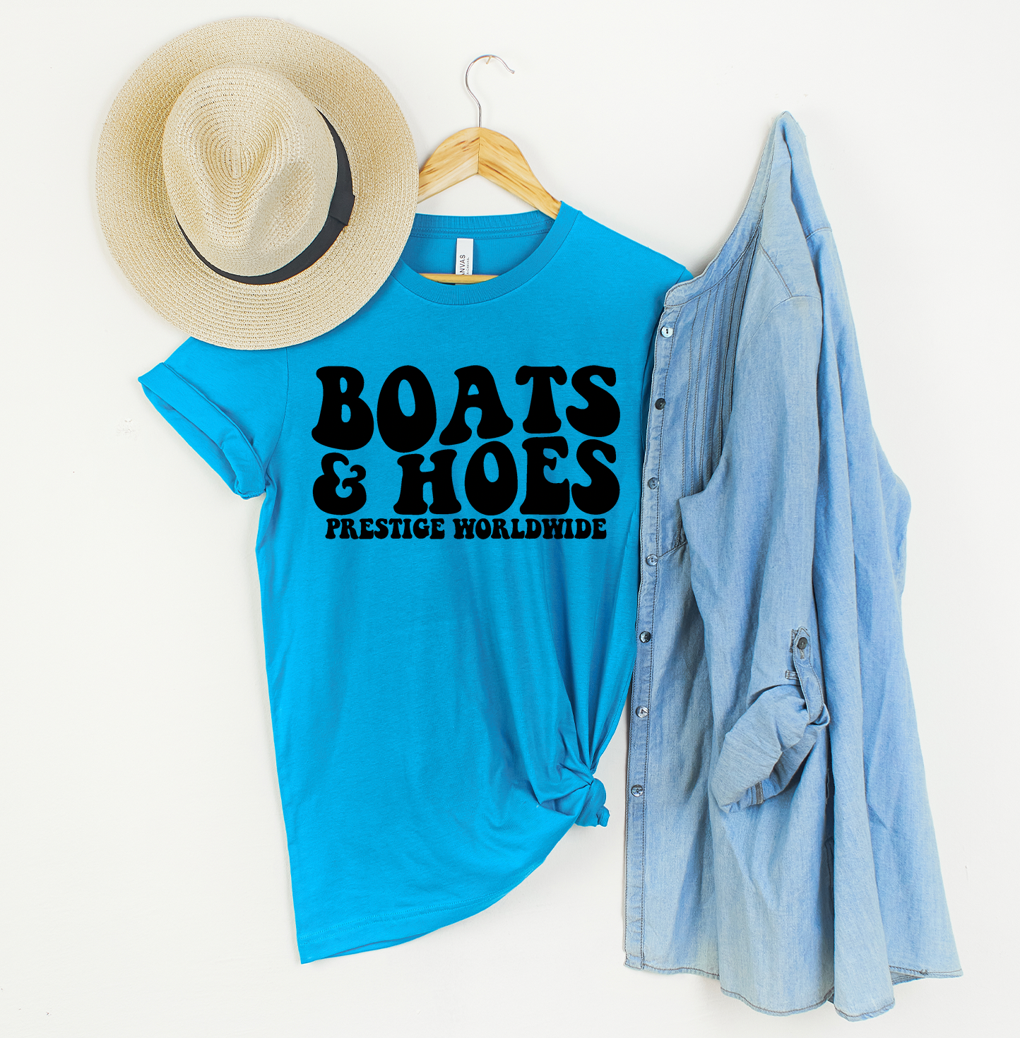 Boats and Hoes Unisex T-shirt featuring a vibrant graphic design, perfect for summer wear.