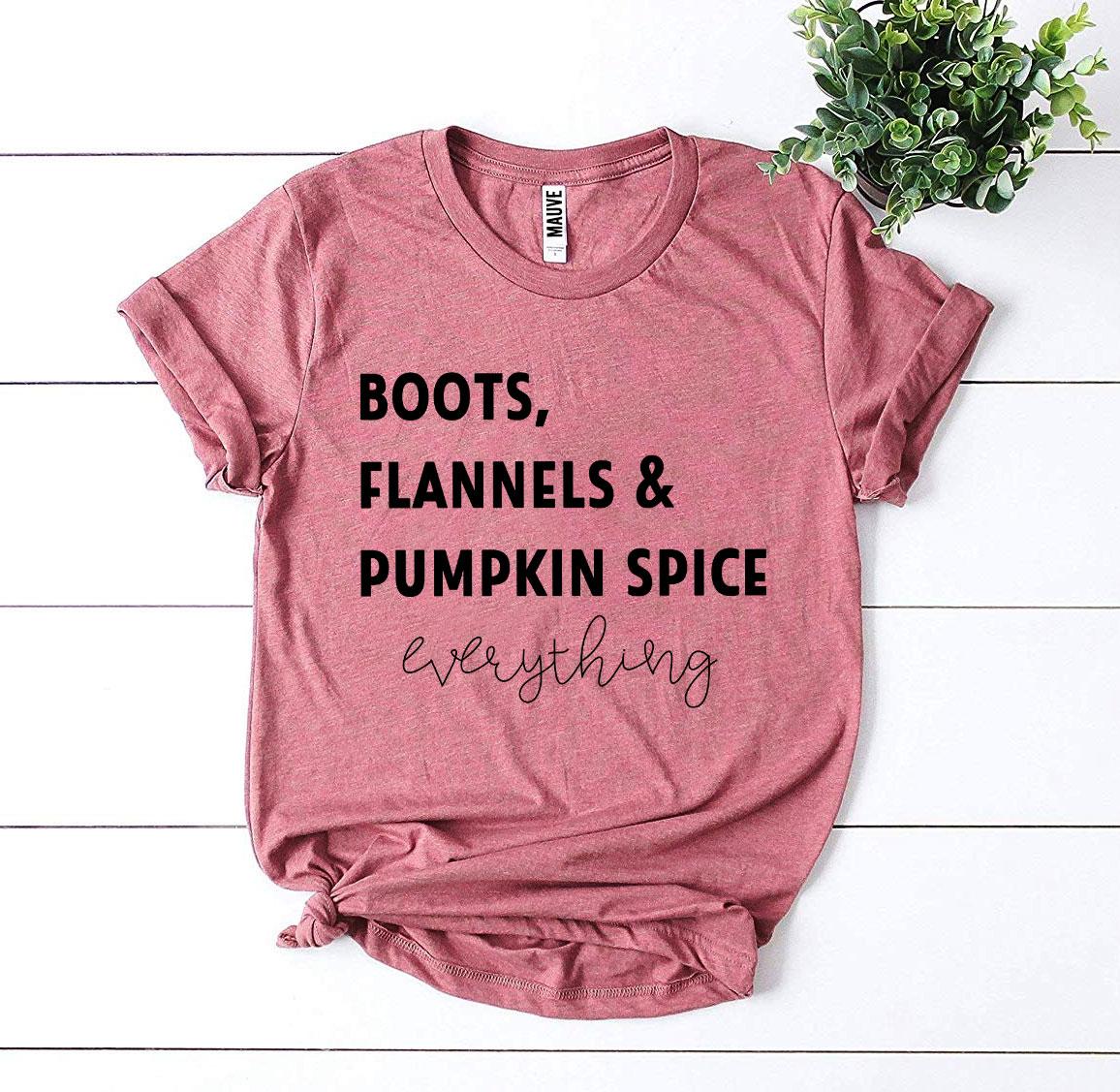 A cozy Boots, Flannels & Pumpkin Spice T-shirt made from premium ring spun cotton, featuring a stylish autumn-themed design.