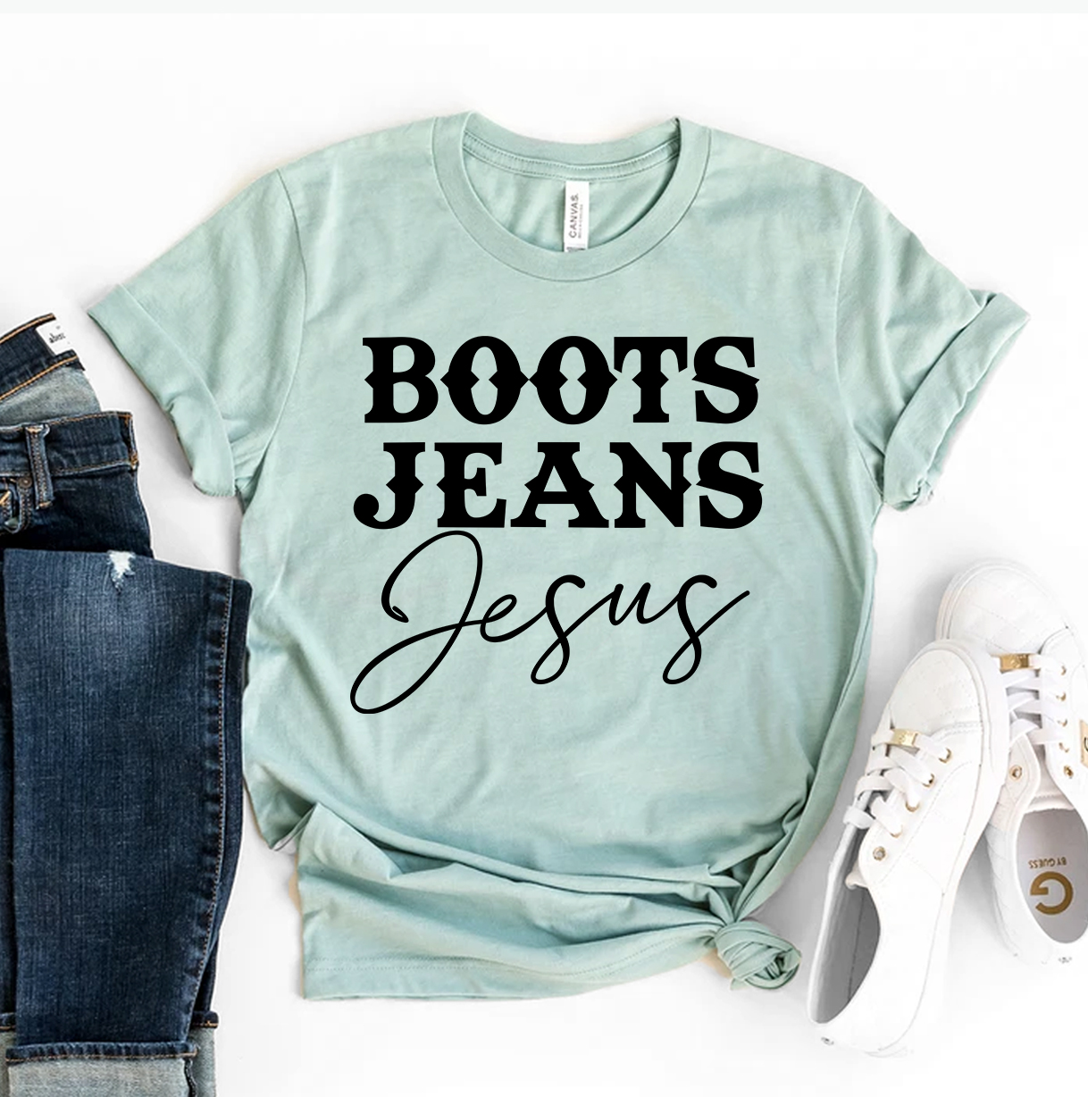 A stylish Boots Jeans Jesus T-shirt made from premium ring spun cotton, featuring a high-quality flex print design.