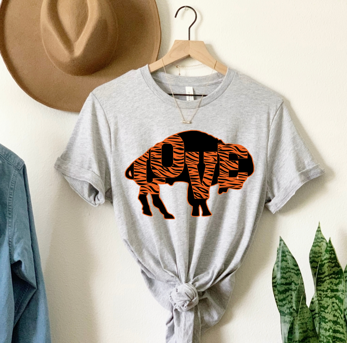 Buffalo Love Cincinnati Unisex T-shirt featuring a vibrant design, perfect for casual wear.