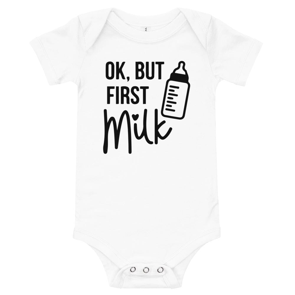 A cute and comfy But First Milk Onesie in various colors, perfect for babies, featuring a fun design and three-snap closure.
