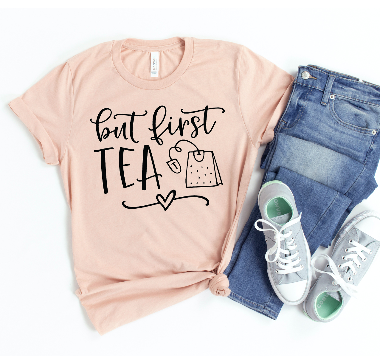 A stylish unisex But First Tea T-shirt made from soft airlume cotton, featuring a casual design perfect for tea lovers.