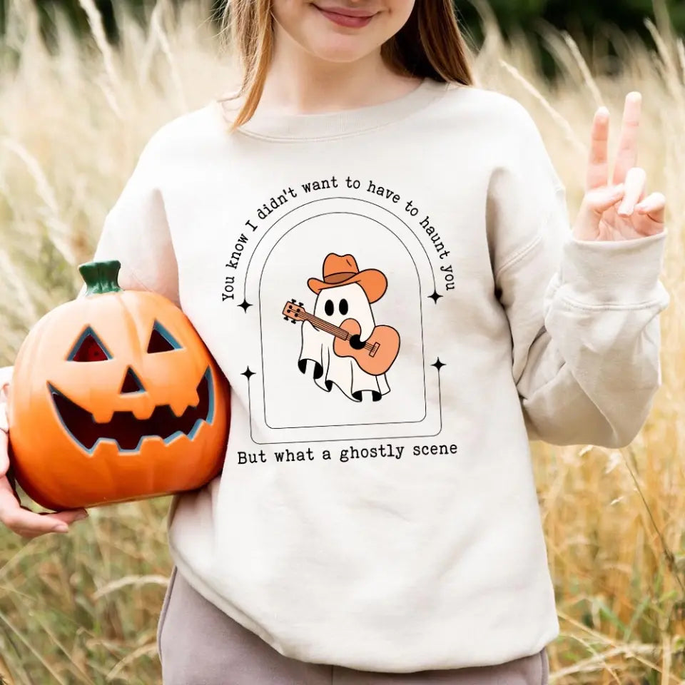 A stylish Halloween top featuring a ghostly scene design, perfect for festive celebrations.
