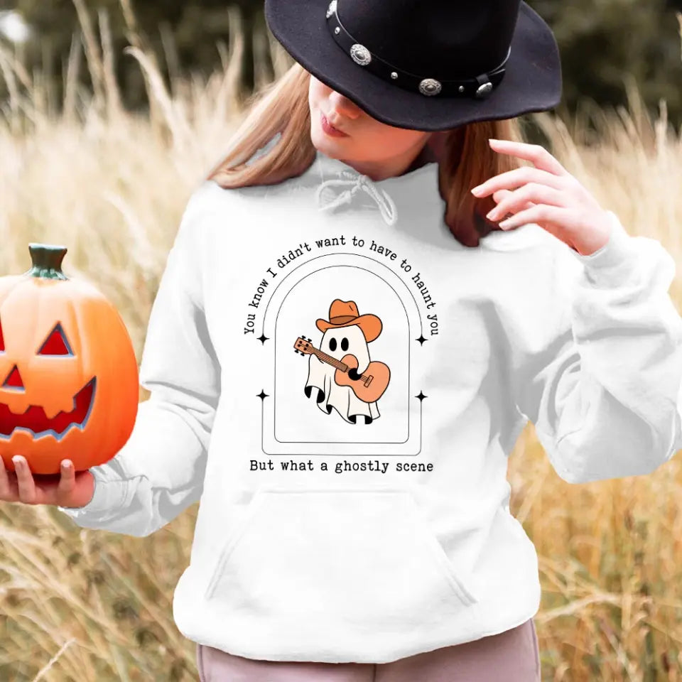 A stylish Halloween top featuring a ghostly scene design, perfect for festive celebrations.