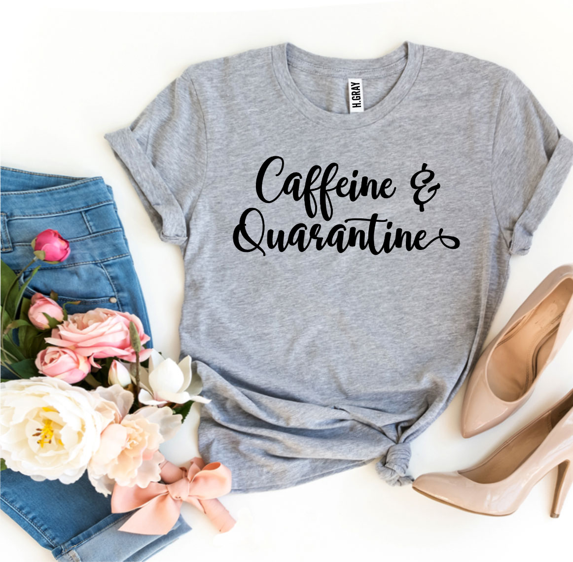 Caffeine & Quarantine T-shirt made of soft ring spun cotton with a humorous design, available in various sizes.