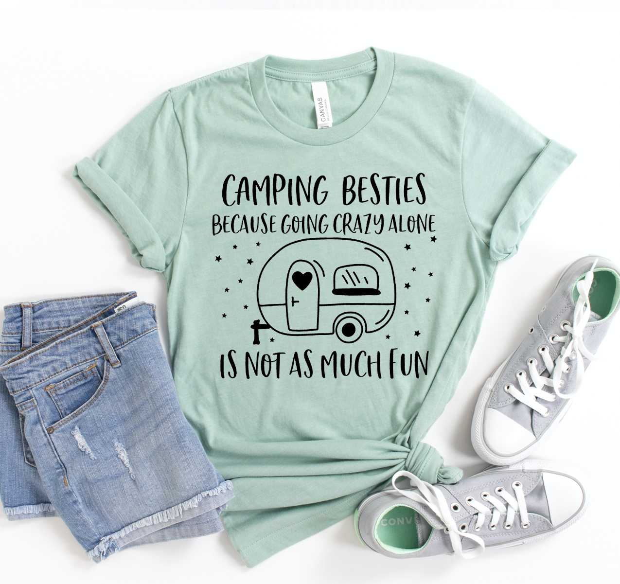 A unisex Camping Besties T-shirt made from soft airlume cotton, perfect for outdoor adventures.