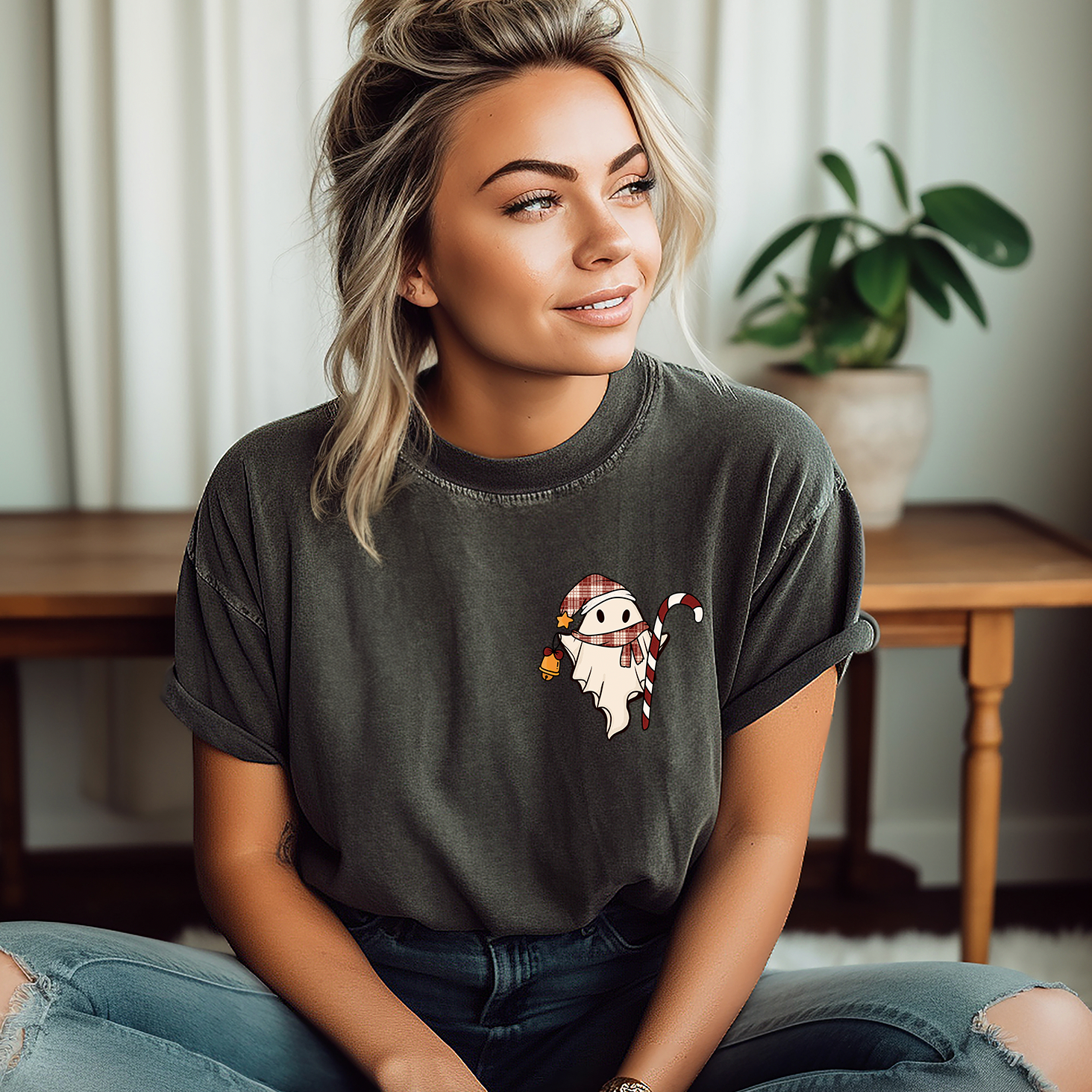 Candy Cane Ghost Unisex T-shirt featuring a whimsical design on a soft fabric, perfect for festive occasions.