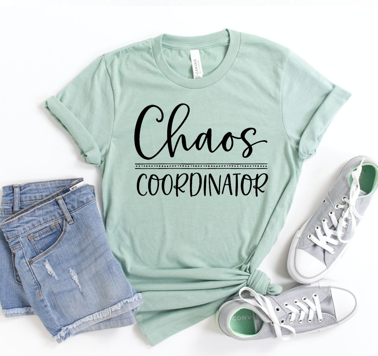 Chaos Coordinator T-shirt in various sizes, showcasing its soft fabric and stylish design.