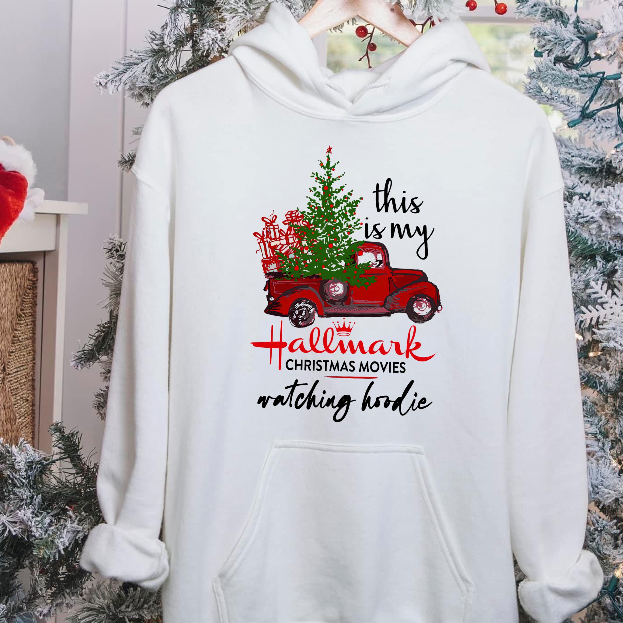 A cozy unisex Christmas Movie Watching Hoodie featuring festive designs, perfect for holiday movie nights.