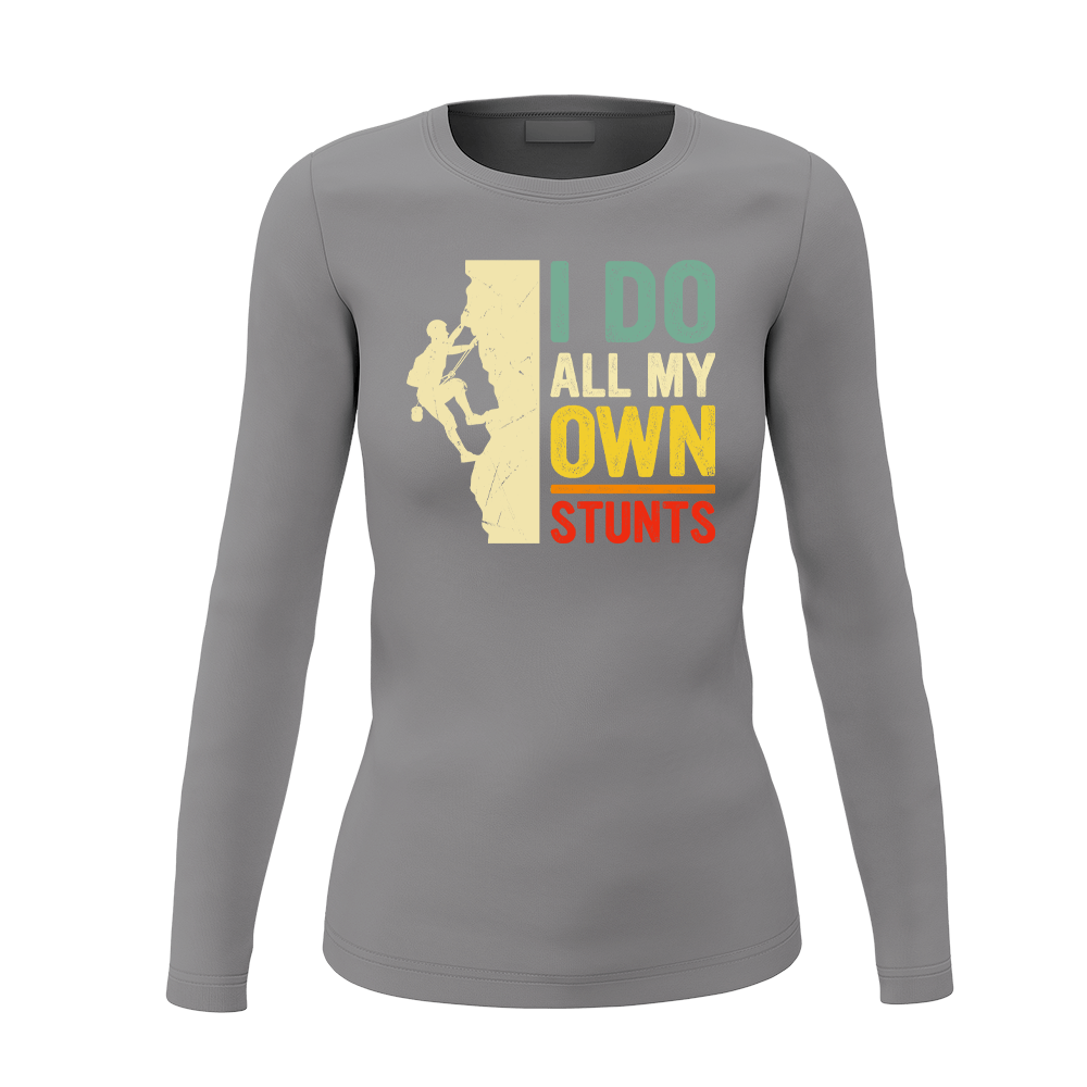 A stylish women's long sleeve shirt featuring the phrase 'I Do All My Own Stunts' with a climbing theme, perfect for adventurous outings.