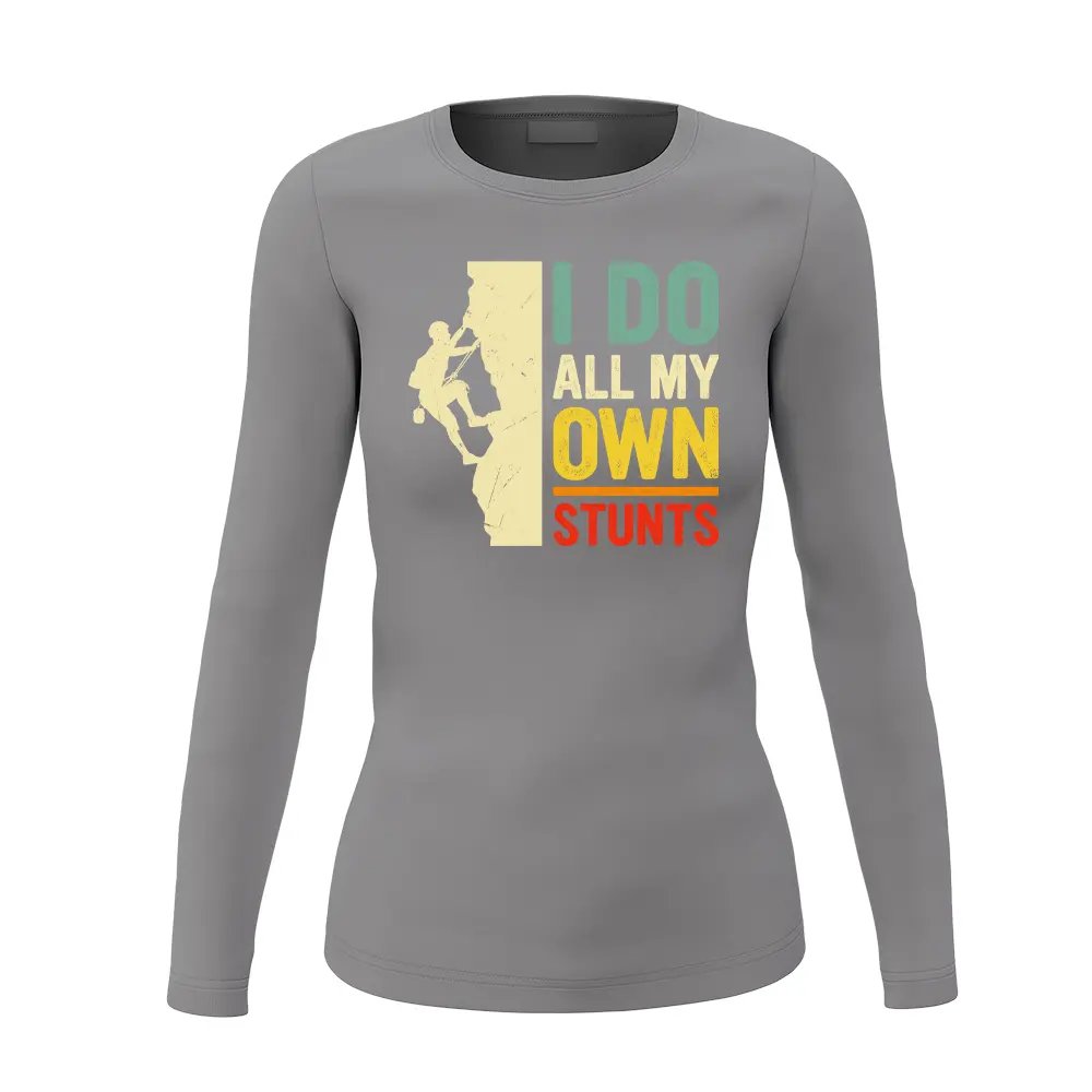A stylish women's long sleeve shirt featuring the phrase 'I Do All My Own Stunts' with a climbing theme, perfect for adventurous outings.