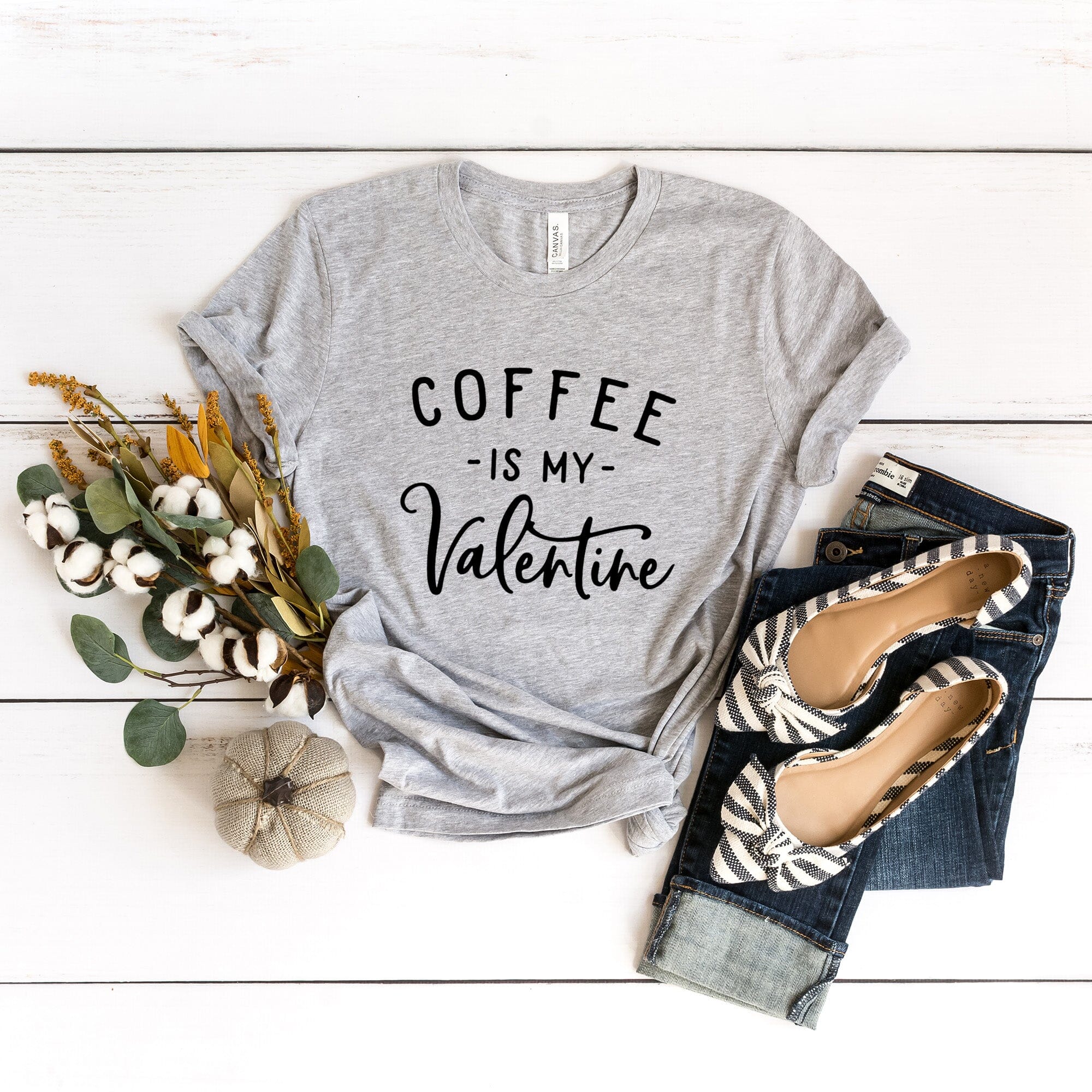 A stylish Coffee Is My Valentine Tee featuring a playful design, made from soft ringspun cotton, perfect for coffee lovers.