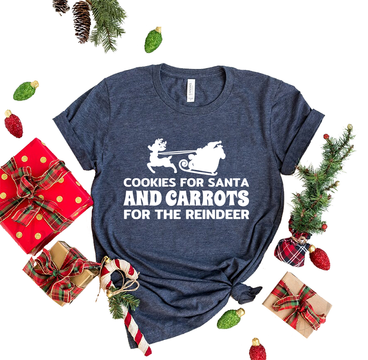 A festive unisex T-shirt featuring a playful design with cookies and carrots, perfect for holiday celebrations.