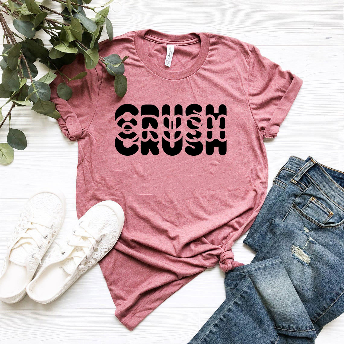 A stylish unisex Crush Shirt made from soft ring spun cotton, available in various colors and sizes, featuring a classic crew neck and short sleeves.