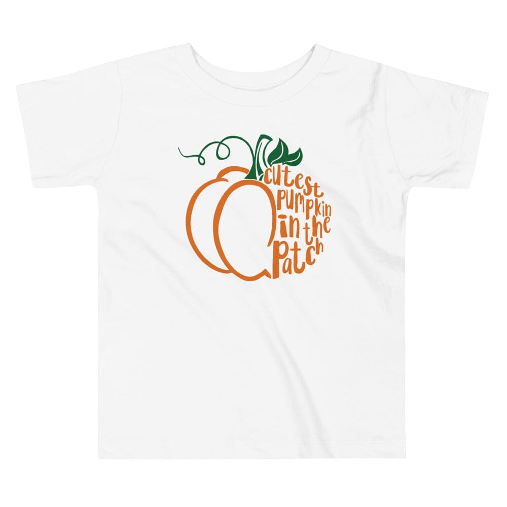 A cute toddler wearing the Cutest Pumpkin in The Patch Tee, featuring a vibrant pumpkin design, perfect for fall and Halloween.