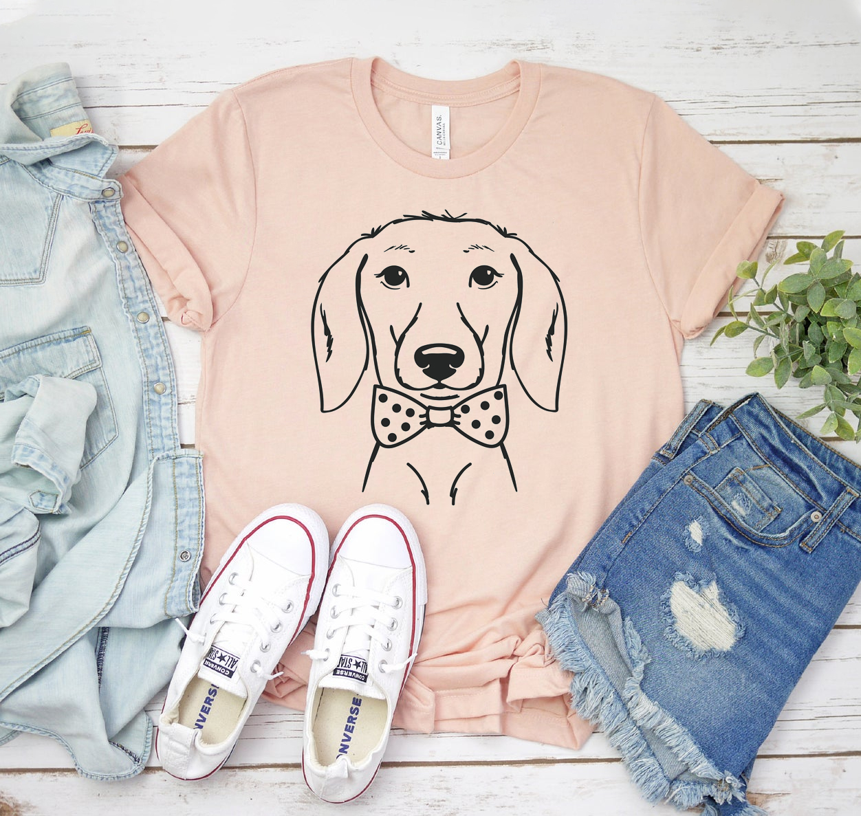 A stylish unisex Dachshund Dog T-shirt made from soft cotton, featuring a classic design perfect for dog lovers.