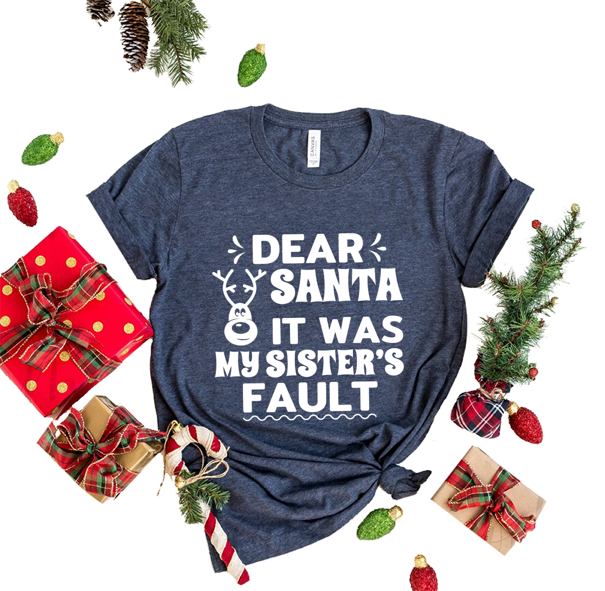Unisex T-shirt featuring 'Dear Santa It Was My Sister's Fault' design, available in multiple colors and sizes.