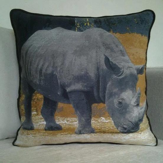 Beautiful African decorative throw pillow cover featuring a unique rhino design, made from high-quality cotton fabric.